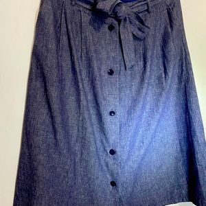 Indigo front button pleated skirt with pockets